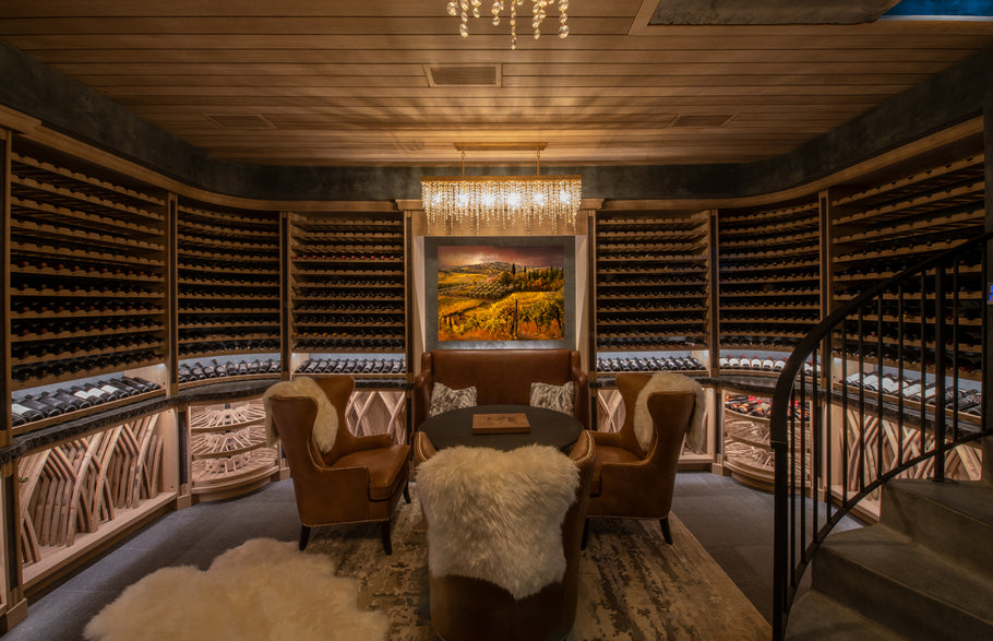 White oak wine cellar features complex curves, storage and entertainment space